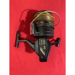 REEL DAIWA DF-100 NEGRO CON TANZA, USADO! Oferta opilarsur